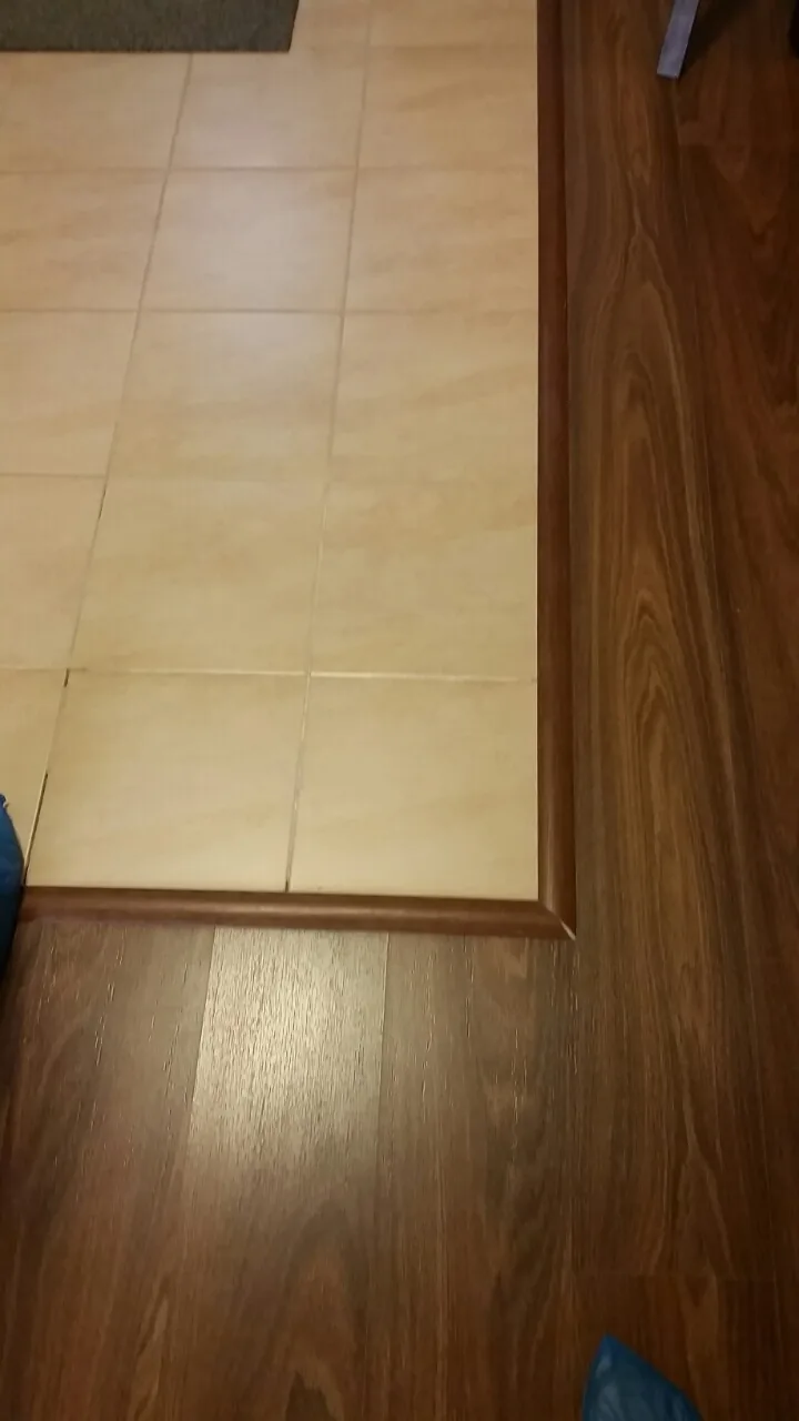 Ремонт квартиры Москва: стык плитки и ламината после чистовой отделки